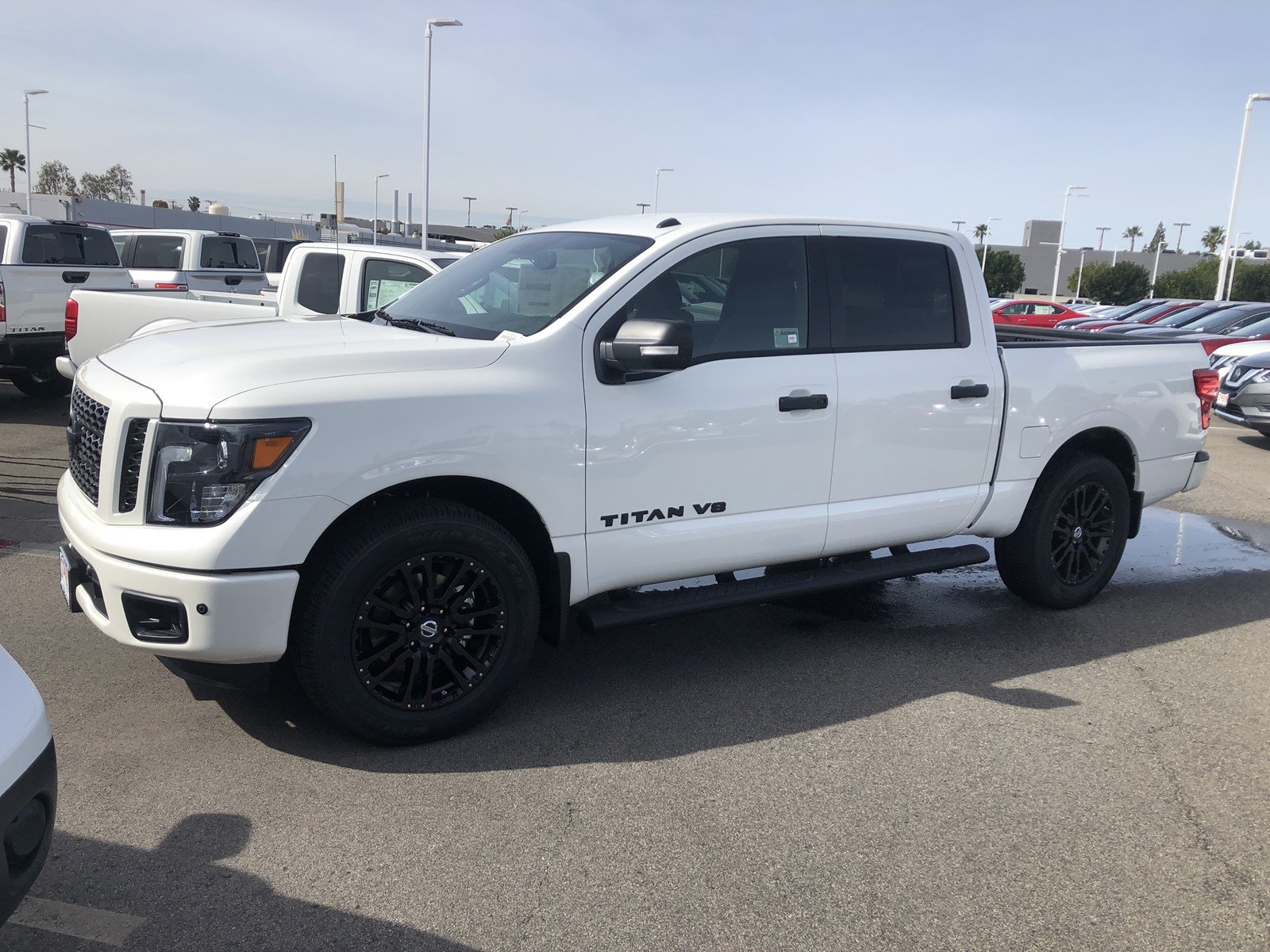 New 2019 Nissan Titan SV Crew Cab Pickup in Orange #197475 | Stadium Nissan