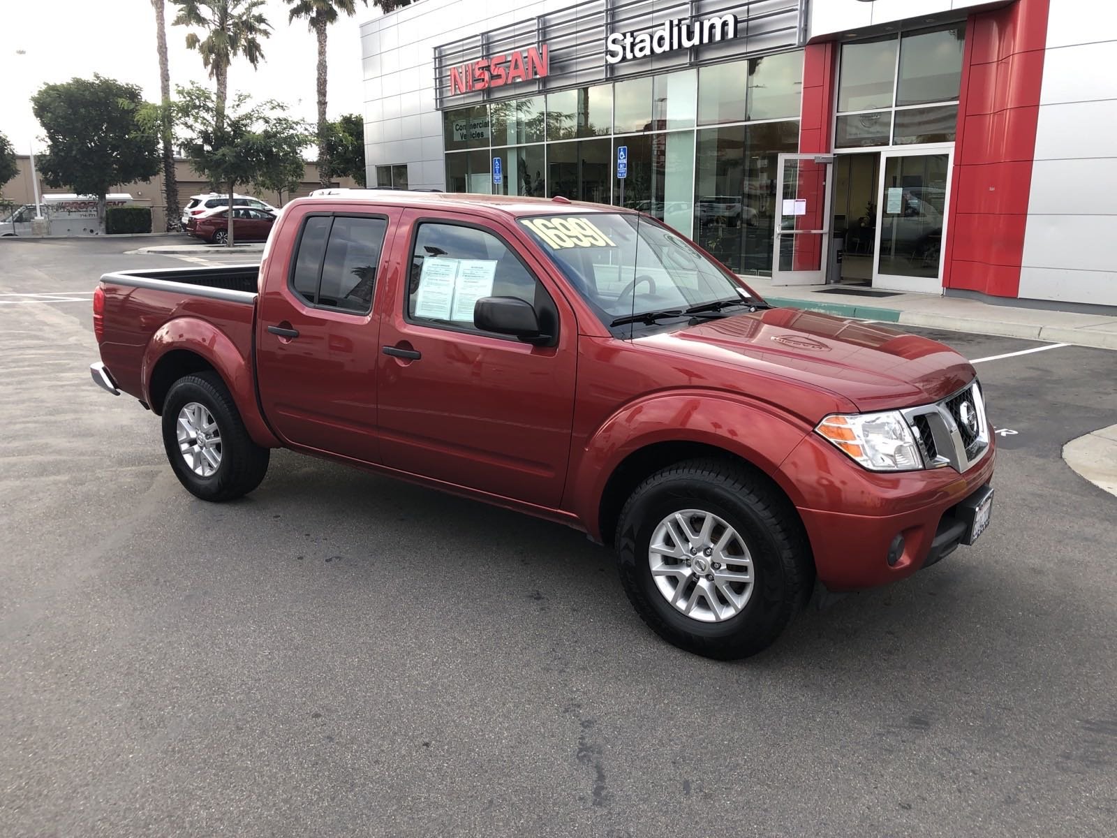 Pre-Owned 2015 Nissan Frontier SV Crew Cab Pickup in Orange #19154T ...