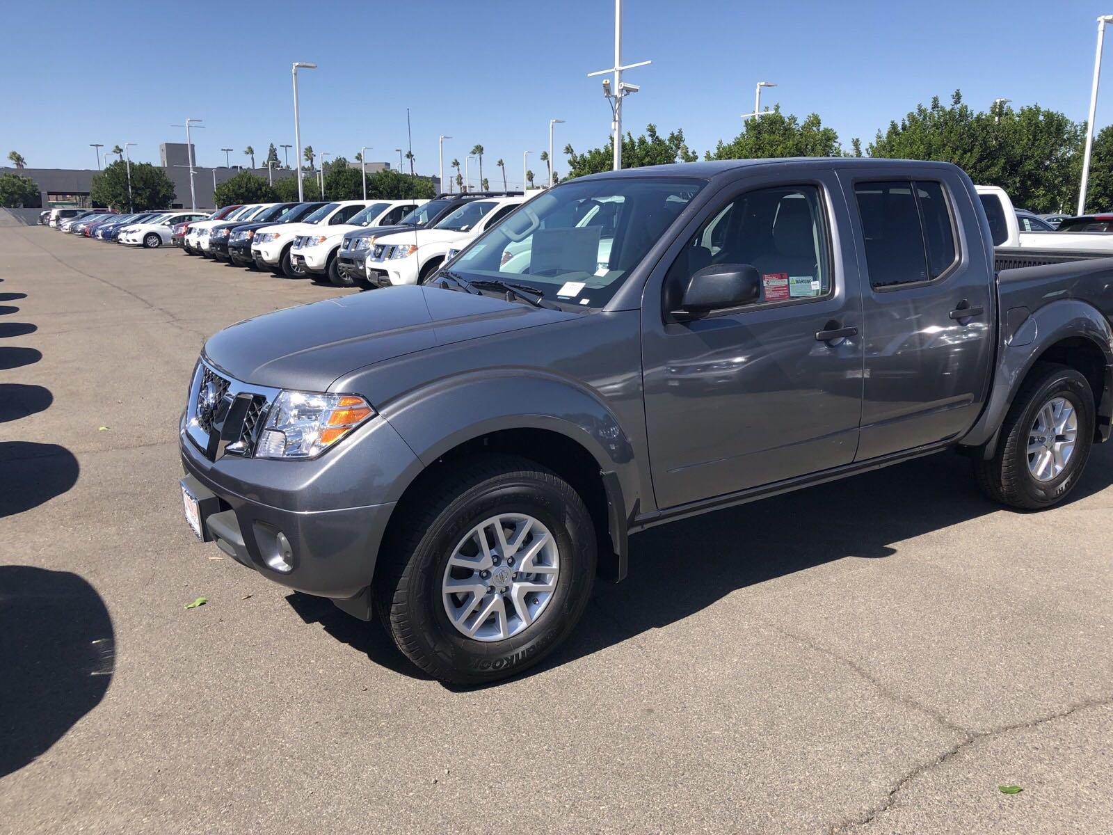 New 2019 Nissan Frontier Crew Cab Pickup in Orange #786931 | Stadium Nissan