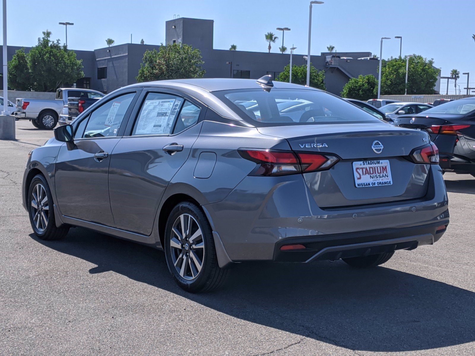 New 2020 Nissan Versa SV 4dr Car in Orange #209182 | Stadium Nissan